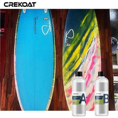 Les fibres de carbone dégagent des revêtements de résine époxyde sur les stratifications du bois de planche de surf