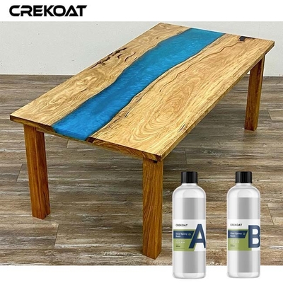 La colle claire de moulage de résine époxyde pour la barre de dessus de table apprête les finitions du bois